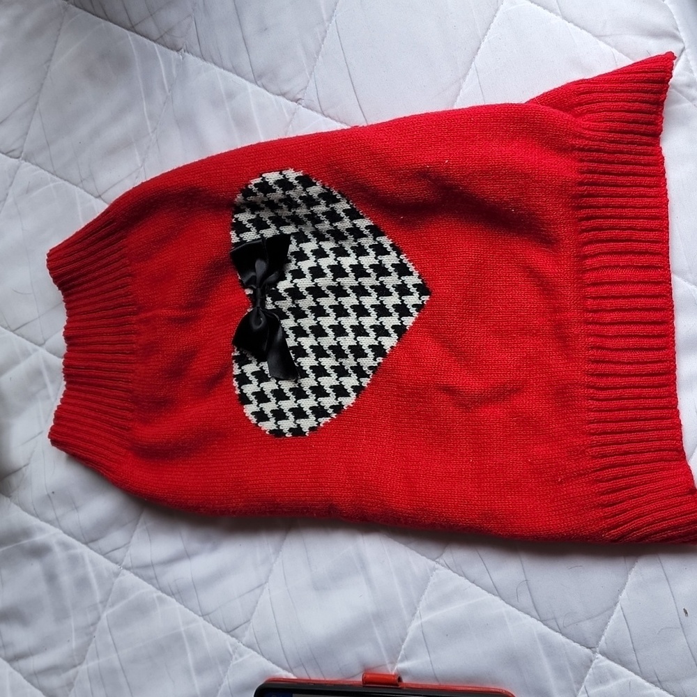 Dog sweater the red one is sold